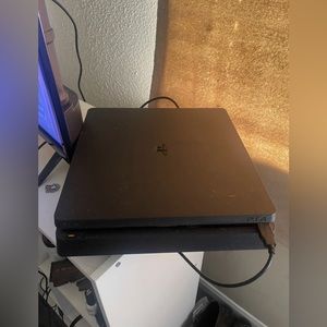 PlayStation 4 console with headset and controller and all cords